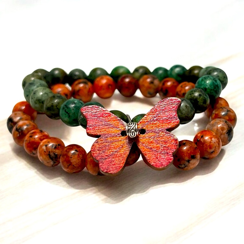 A Craftsmanship and beauty butterfly charm and colorful stone bead bracelet